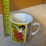 vintage ceramic mug from the Monopoli Brand featuring cabaret poster illustration Image 6