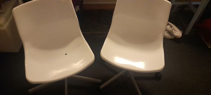 white ikea desk and two chairs
