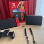 Nintendo Switch OLED (Neon Blue/Red) + Mario Kart 8 Deluxe + Super Mario Bros. W Image 8