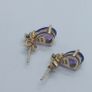 9ct yellow gold amethyst and diamond stud earrings. Image 3