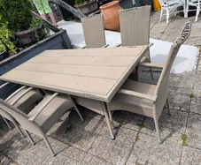 wicker garden set  .bit of damage on top of the chairs but still very useful