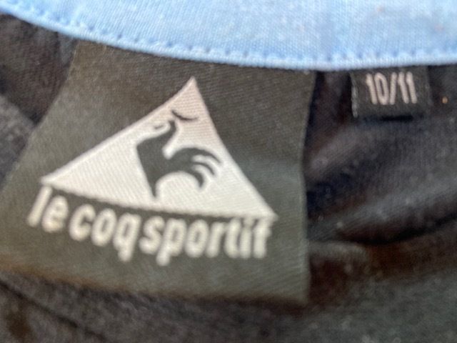 Le Coq Sportif tee shirt. Age 10-11. Black.