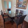 Luxurious 6-Seater Tempered Glass Dining Table with Leather Chairs Image 2