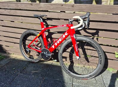 Trek Madone SL6 rim brake in vibrant red.