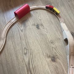 Wooden train track with small magnetic train