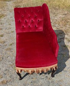 Victorian-style red velvet chaise lounge