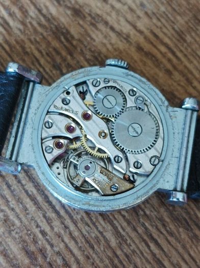 very old manual Foreign watch. Leather strap. Working. Beautiful 15 Jewels manual wind movement Swiss made .