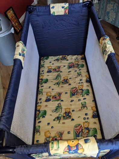 Folding baby cot Kiddi-o