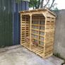 Large logstores and seasoned firewood bundles Image 4
