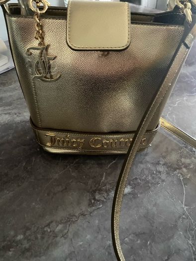 Juicy Couture gold handbag