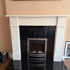 granite fireplace with electric fire