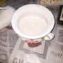His and Hers Old Ceramic Chamber Pots hand painted floral chamber pot with side handle, together with a white glazed shaped bottle featuring scroll handle and narrow spout Image 3