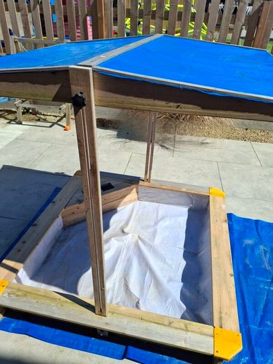 sand pit with canopy roof