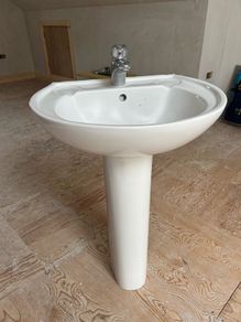 Sink with pedestal