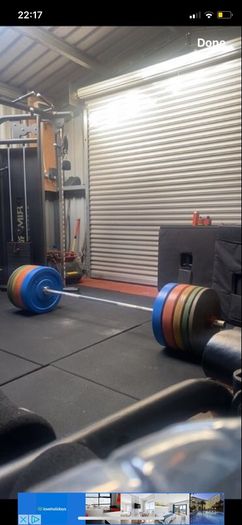 20kg olympic barbell and 150kg of bumper plates