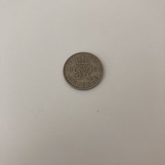 English six pence 1951