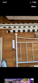 white metal double bed