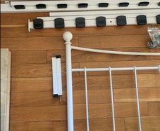 white metal double bed
