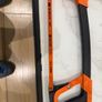 Tactix 300mm (12-inch) high-tension hacksaw with an orange and black frame Image 4