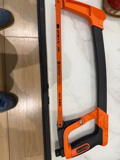 Tactix 300mm (12-inch) high-tension hacksaw with an orange and black frame