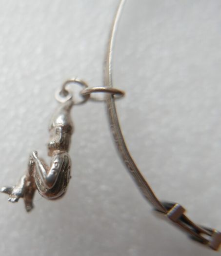 Vintage 925 Sterling Silver bangle with charm