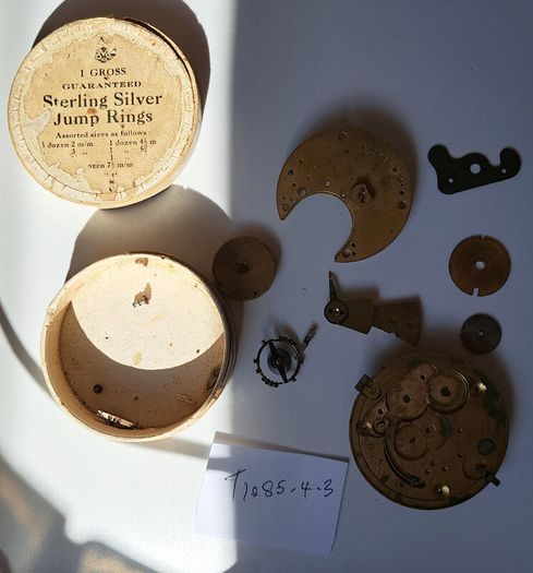 Lot of Antique Watch Parts in Containers