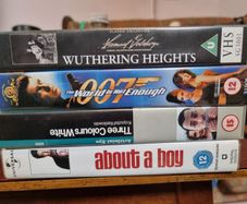 4 VHS tapes (The Olivier Wuthering Heights, The World is not enough 007, Three colours: White, About a boy)