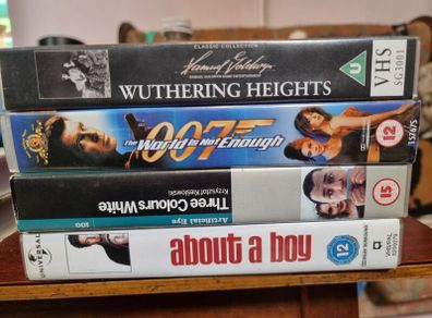 4 VHS tapes (The Olivier Wuthering Heights, The World is not enough 007, Three colours: White, About a boy)