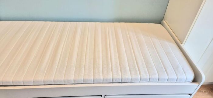 Single bed with mattress and storage