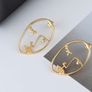 Golden Artistic Face-Shaped Earrings Minimalist Statement Jewelry Image 4