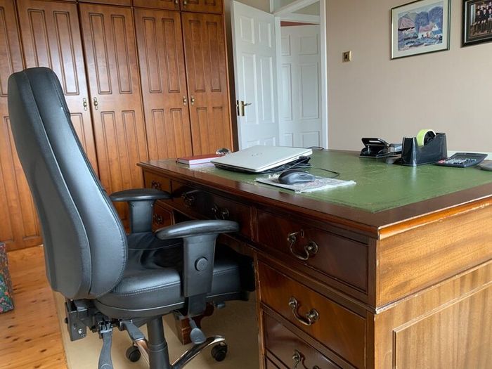 8 drawer Mahogany office desk & orthopaedic chair