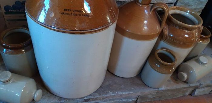 Collection of Eight Antique Stoneware Jars including Two Antique Hot Water Bottles