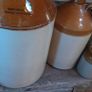 Collection of Eight Antique Stoneware Jars including Two Antique Hot Water Bottles Image 5