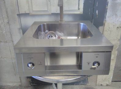New stainless steel sink.. industrial by SMEG with all waste and tap fittings