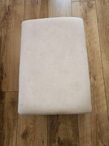 Swinging foot stool