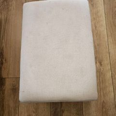 Swinging foot stool