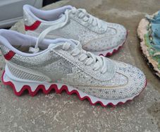 ladies runners  Christian Louboutin's shark trainers