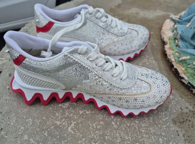 ladies runners  Christian Louboutin's shark trainers