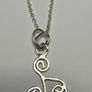 Sterling silver Triskele pendant on 18 or 20 inch chain. Image 2