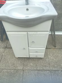 Vanity unit also shower door