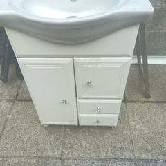 Vanity unit also shower door