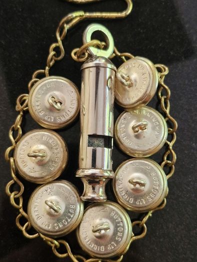 An Early Garda Siochana Whistle And Set Of 7 Buttons