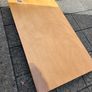 Solid wood dining table. Damage on corner as shown in photos. Image 6