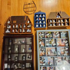 Collection Of Over 120 Ceramic And Metal Timbles In 5 Wall Hanging Cabinets. All In Good Condition.  See Photos For Same.