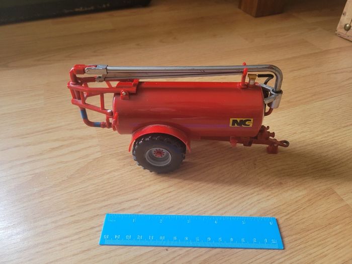 Toy farm shed, animals and machinery