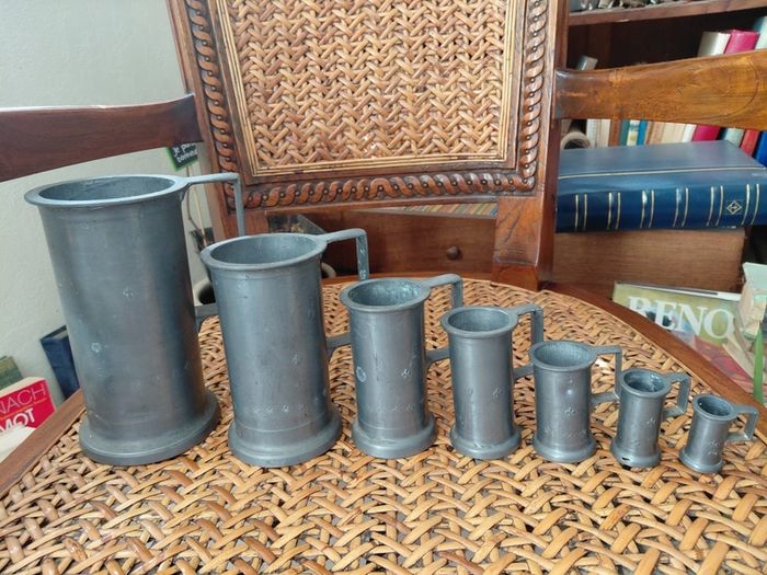 Antique French solid pewter measuring tankards Fleurs de lys complete set