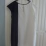 A Classic Black & White Sleeveless Dress Image 2