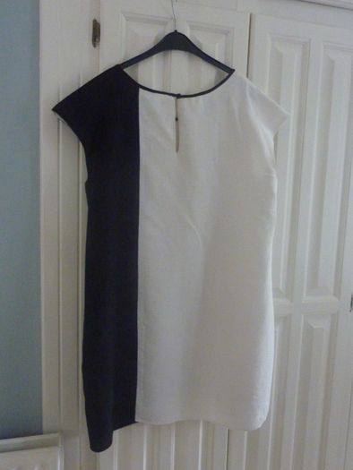 A Classic Black & White Sleeveless Dress