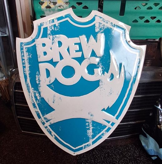 Tin sign