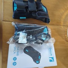 Two left hand wrist braces - 'Thumb Spica'